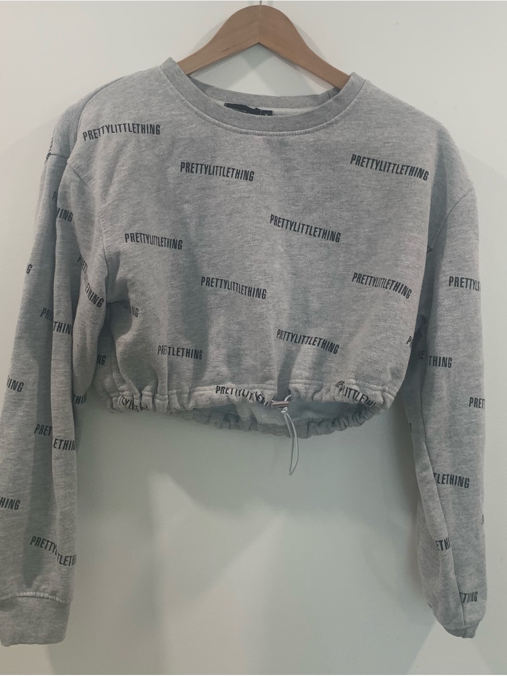 PrettyLittleThing Gray Cropped Logo Drawstring Sweatshirt